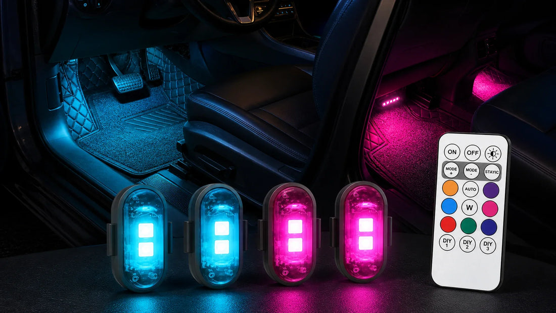 Rechargeable wireless RGB footwell lights and remote adding blue and pink accent lighting inside a parked car cabin.