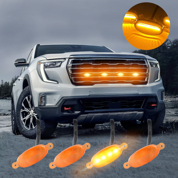 Amber truck grille lights installed on a front grille for a stronger pickup and SUV front-end presence.
