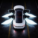 Angel wing car door puddle lights projecting a bright welcome glow beside the vehicle when the doors open at night.