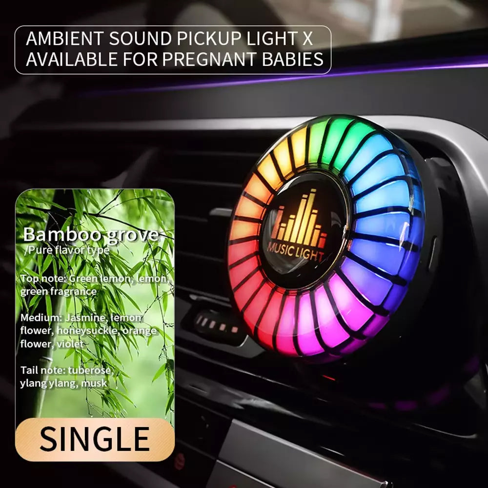 Bamboo scent car air freshener refill paired with RGB vent light for a fresh green cabin atmosphere.