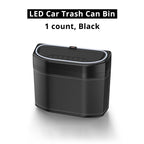 Black LED car trash bin variant with compact storage body and blue light trim for cleaner car interiors.
