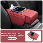 Burgundy car armrest organizer with RGB light ring, cup holder, and center console storage for daily driving.