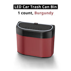 Burgundy LED car trash bin variant with compact storage body and blue light trim for organized interiors.