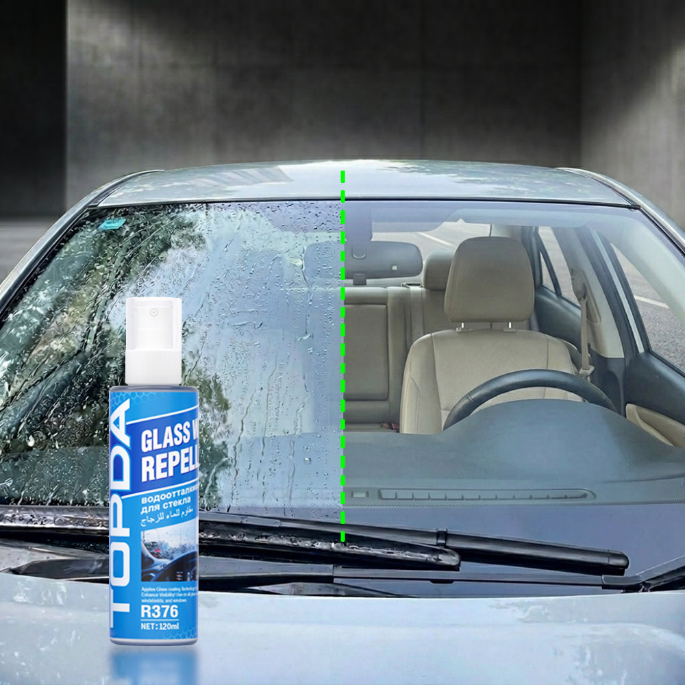 Car glass water repellent on a rain-covered windshield helping water bead away for clearer wet-weather visibility.