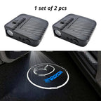 Wireless door projector light with Mazda-style logo option for compatible car door welcome lighting.