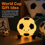 Football themed night light glowing on a kids bedroom nightstand