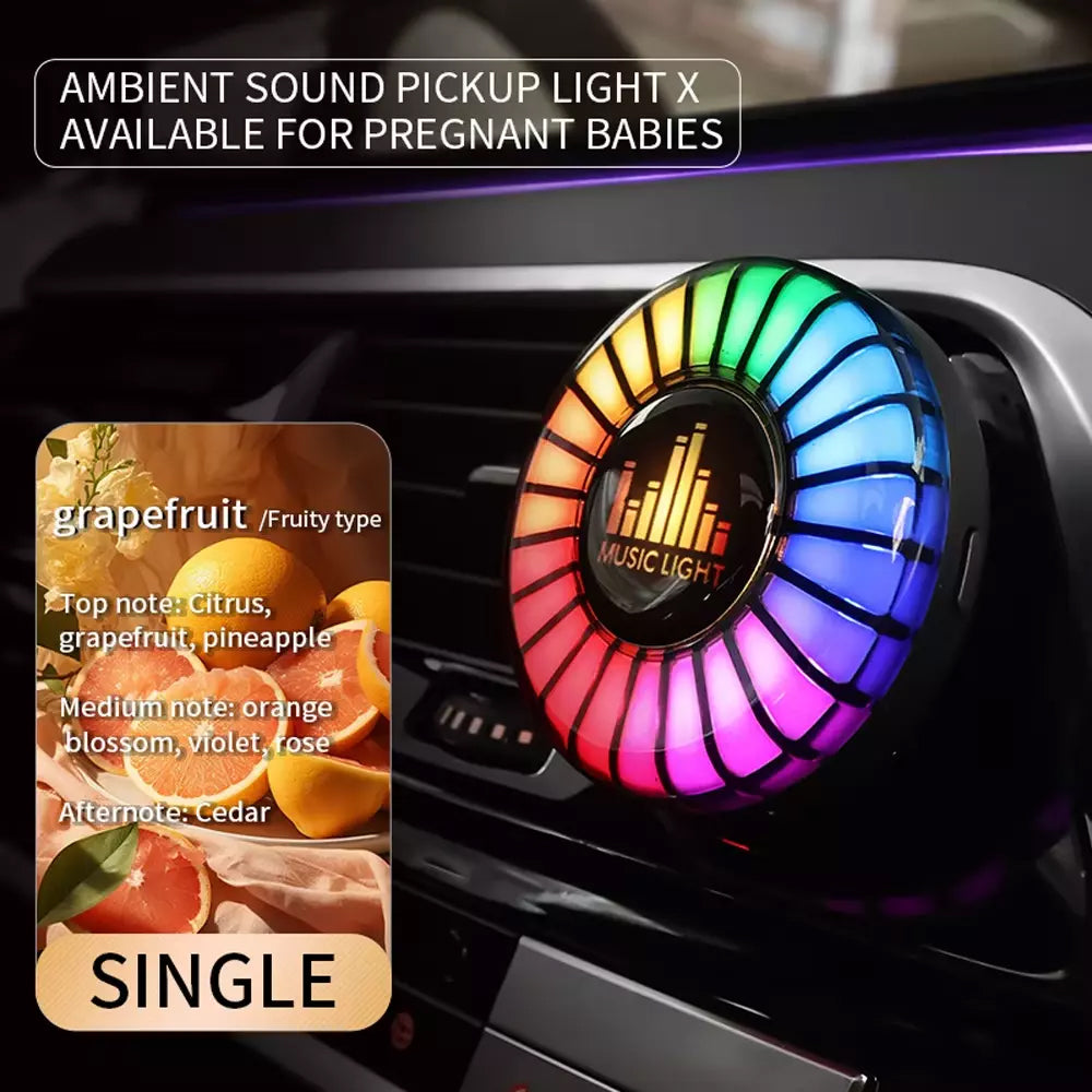 Grapefruit scent car air freshener refill paired with RGB vent light for a fresh citrus cabin atmosphere.