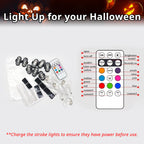 Halloween RGB light package with remote control, charging cable, mounting pads, and rubber bands for seasonal setups.