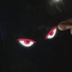 Solar Devil Eyes window light creates a glowing red eye effect on vehicle glass for night display styling.