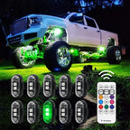 RGB underglow lights add a green glow under a lifted truck for bold night styling on cars, trucks, and SUVs.