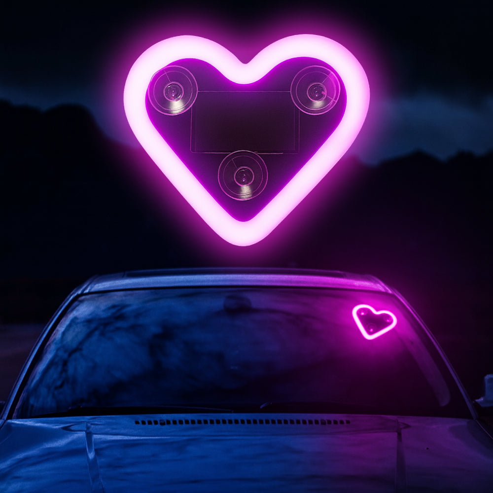 Solar heart LED decor light adds a pink glowing heart to a car windshield for holiday, Valentine, or romantic setups.