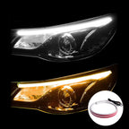 White and amber headlight LED strips installed around the headlight area for DRL styling and turn signal presence.