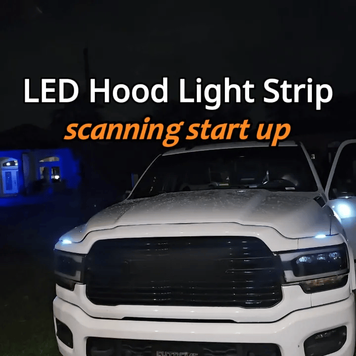 Dynamic scan hood LED strip illuminating a truck front end during startup
